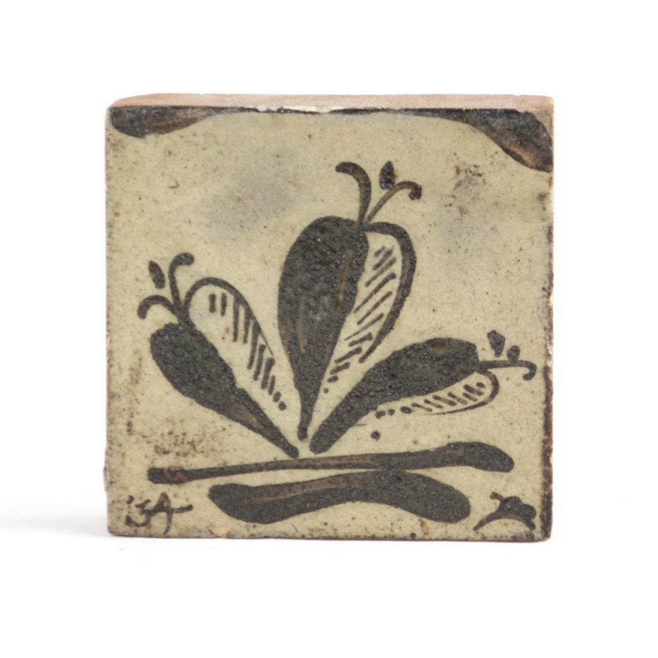 Tile with foliate design